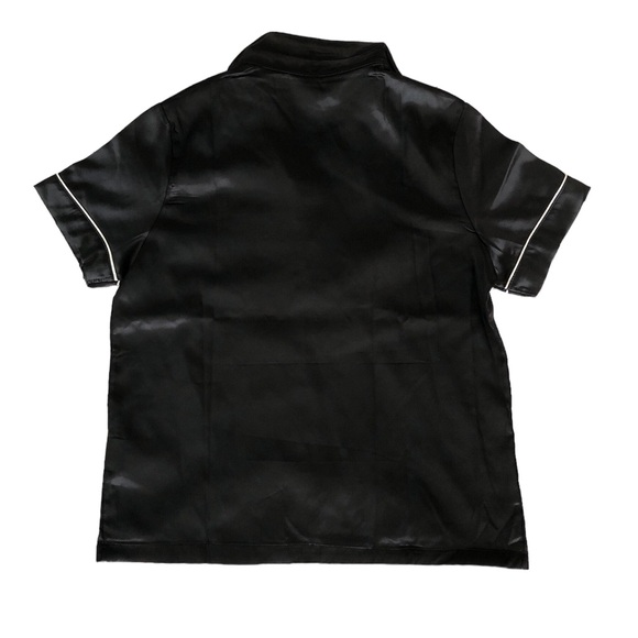 8-9 year old black pajama set. Never worn and in good condition. - Picture 3 of 4